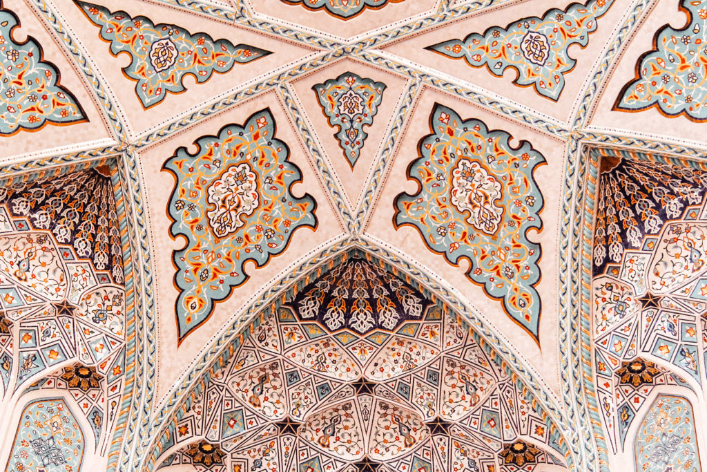 Colourful painted mosaic details in Sultan Qaboos Mosque