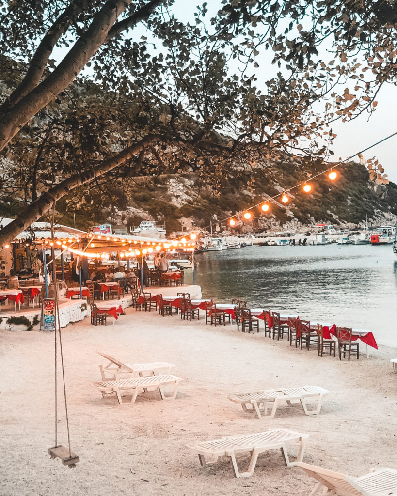 Fairy lit restaurant on the beach at Agios Nikolaos