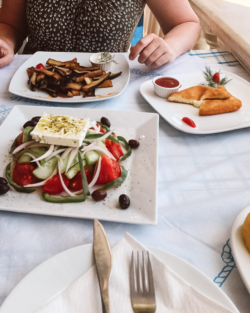 Lunch at Mikro Nisi Taverna of Greek salad and saganaki