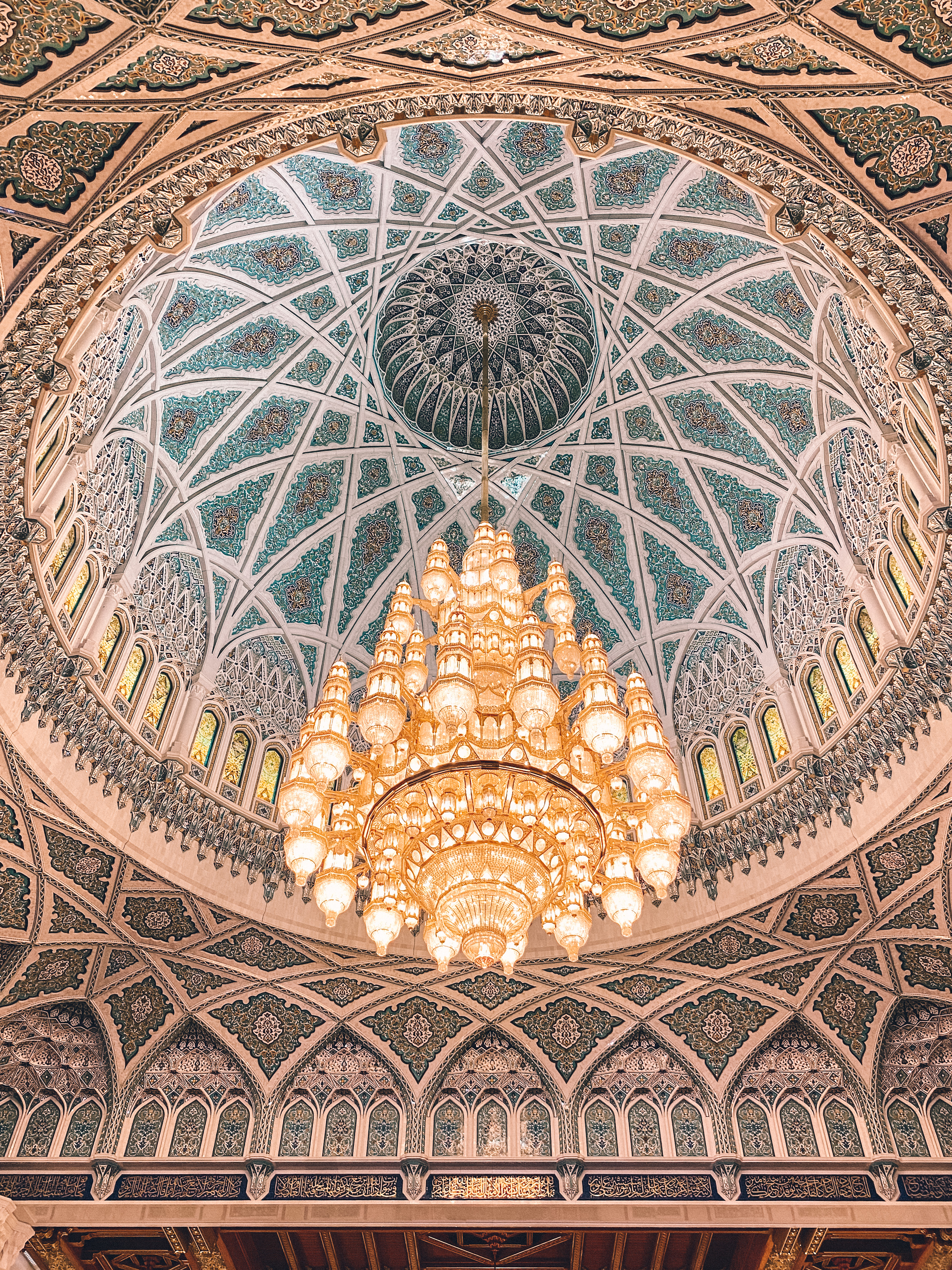 Chandelier and decorative dome inside the Sultan Qaboos Mosque