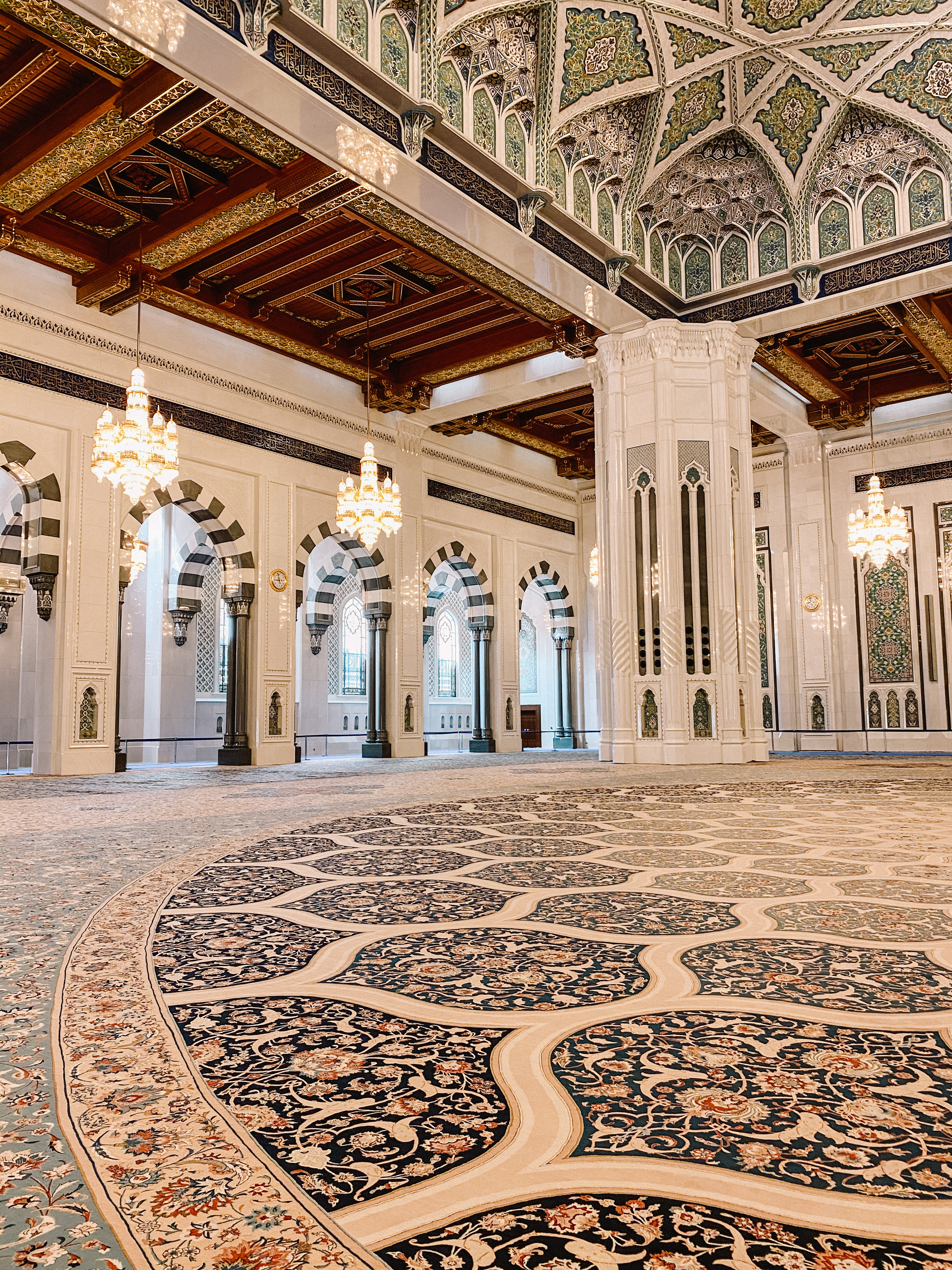 Intricately handwoven carpet in the Sultan Qaboos Mosque central prayer hall 