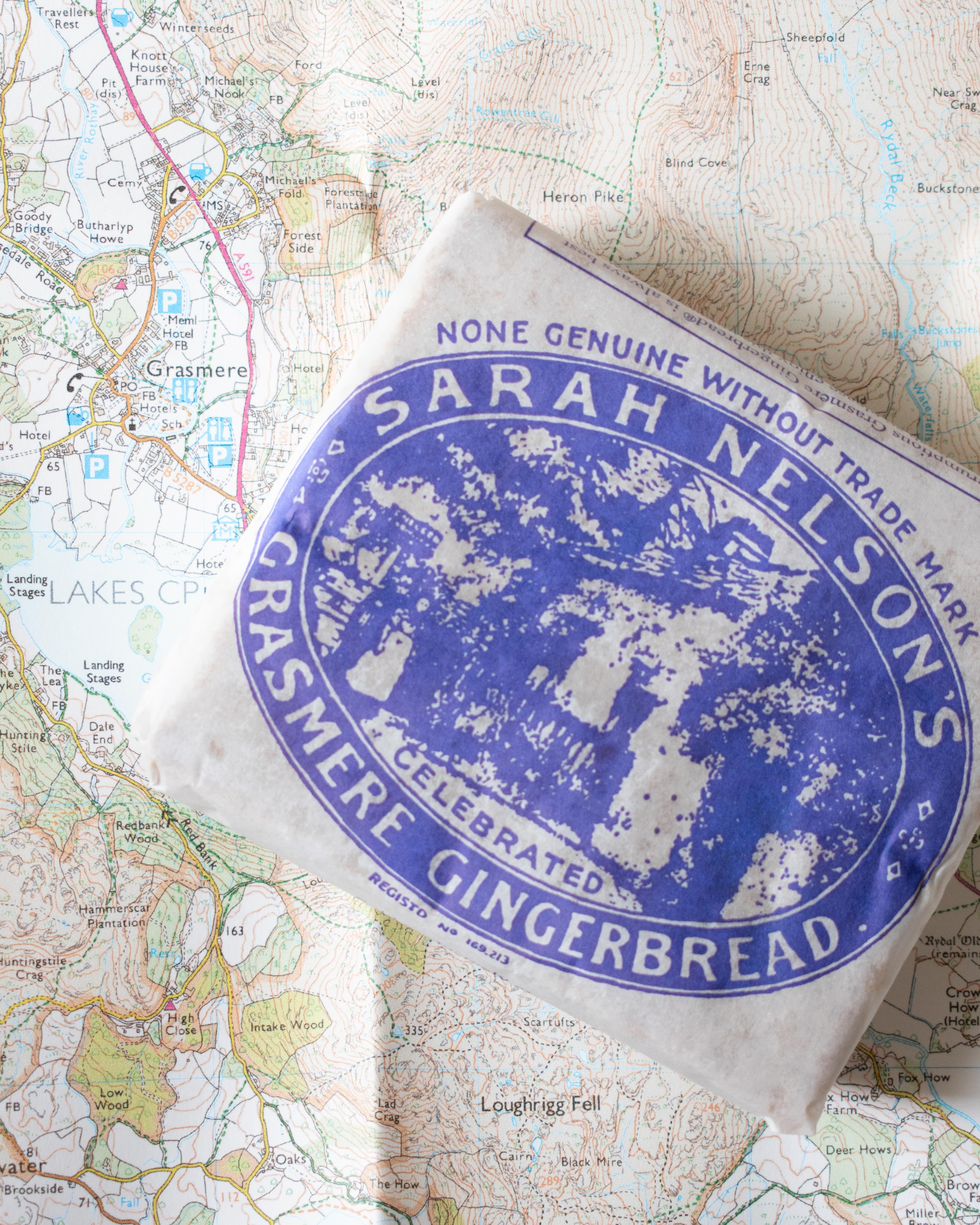 Packet of Grasmere gingerbread on top of OS map of Lake District