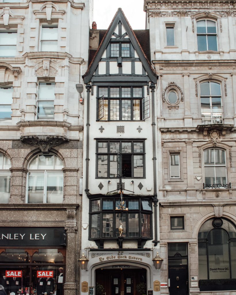 Very narrow black and white building of Ye Olde Cock Tavern