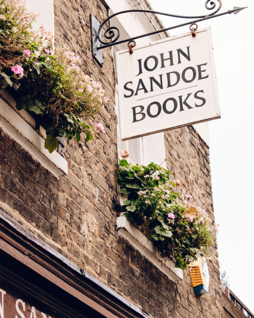 Sign hanging outside John Sandoe books, Chelsea
