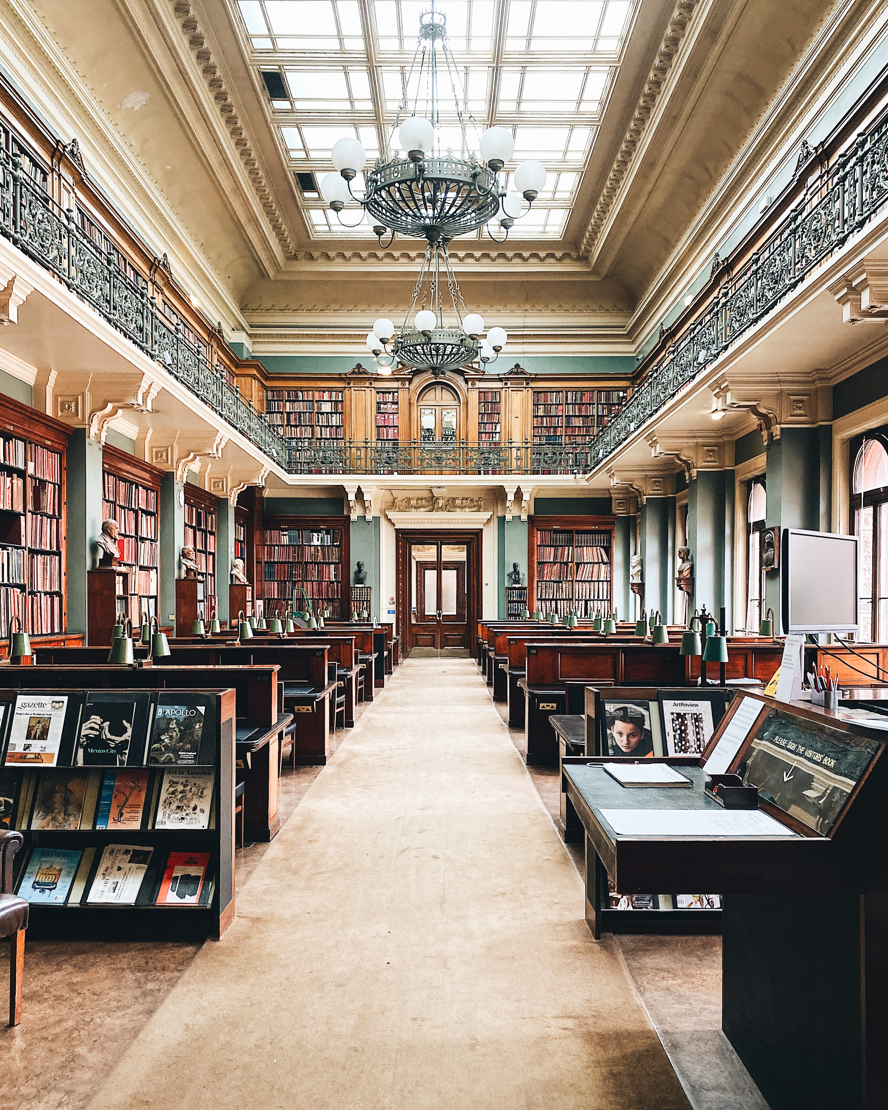 Ornate balcony and bookshelves in the library at the Victoria and Albert Museum