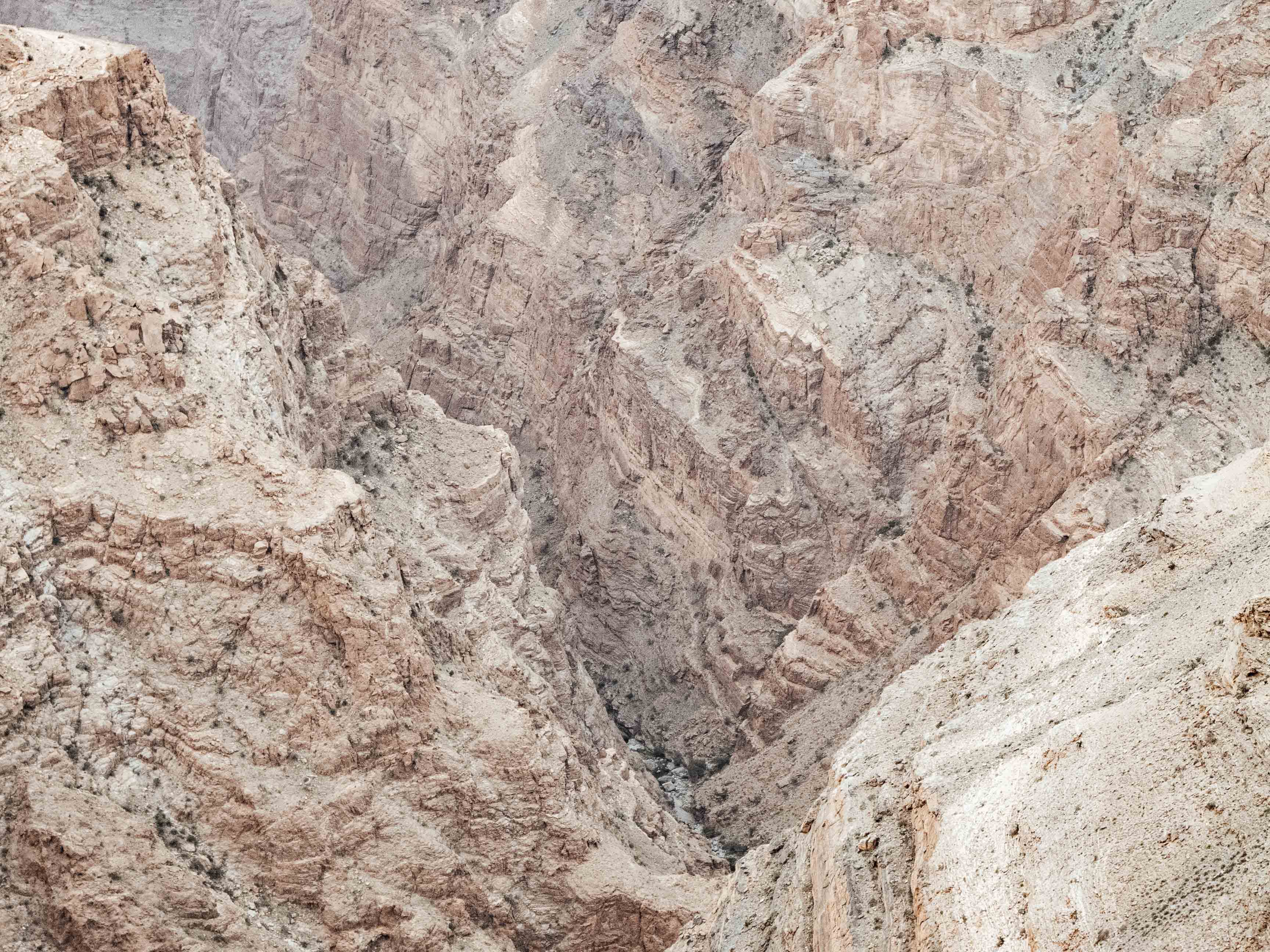 Steep, rocky slopes into a canyon on Jebel Akhdar