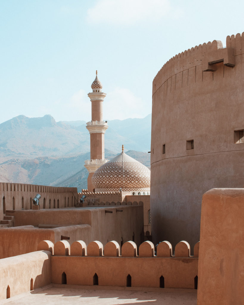 Tiled dome and minaret of Al Qala’a Mosque as seen from Nizwa Fort