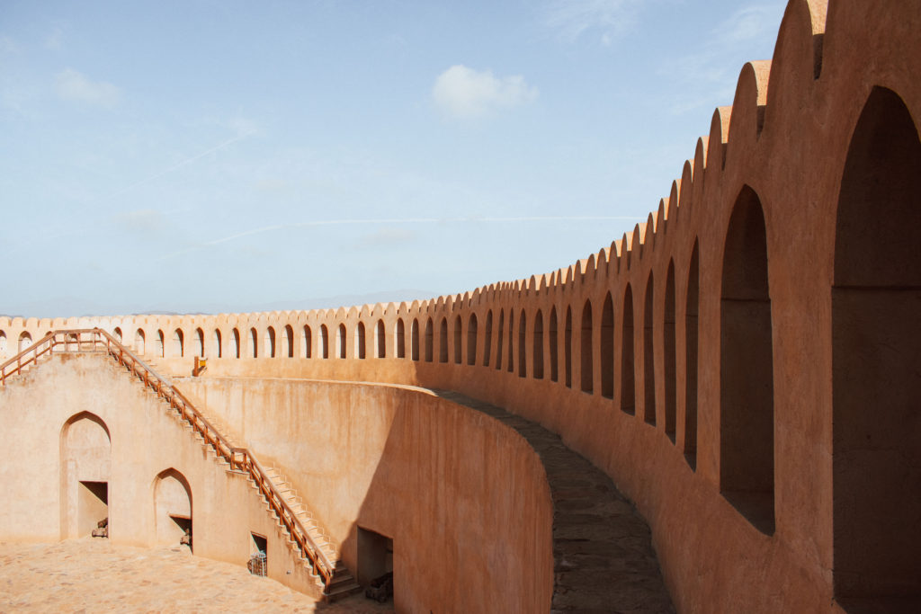Scalloped crenellations of the tower at Nizwa Fort