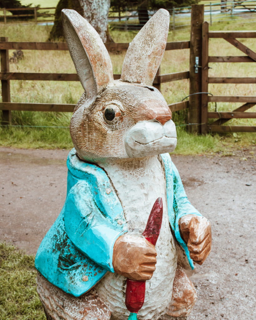 Small wooden Peter Rabbit statue at the Lingholm Kitchen and Garden