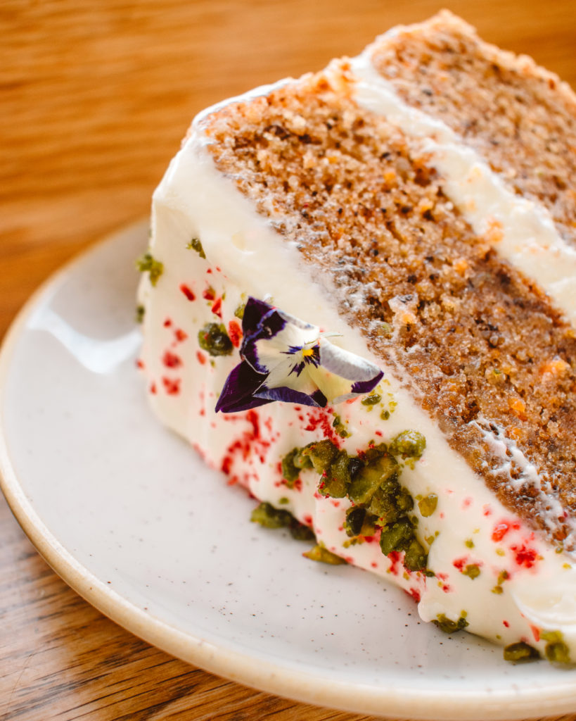 Flower topped garden cake at Lingholm Kitchen and Garden