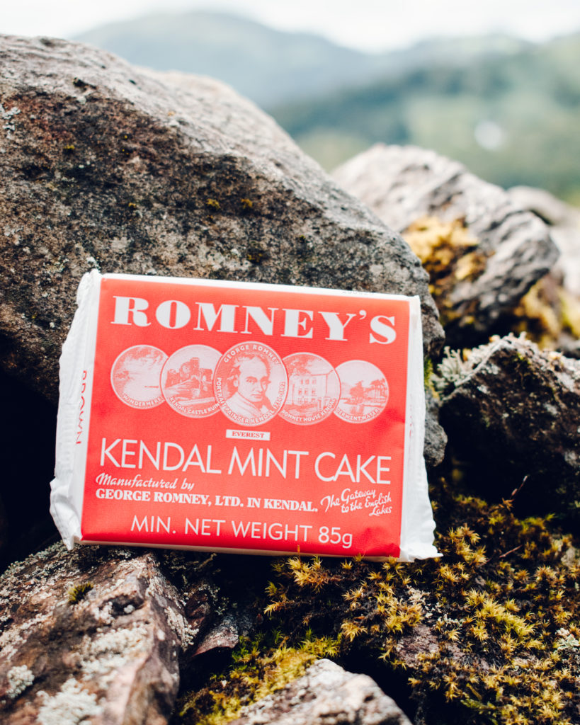 Lake District Foodie - Red Kendal Mint Cake packet on a stone wall