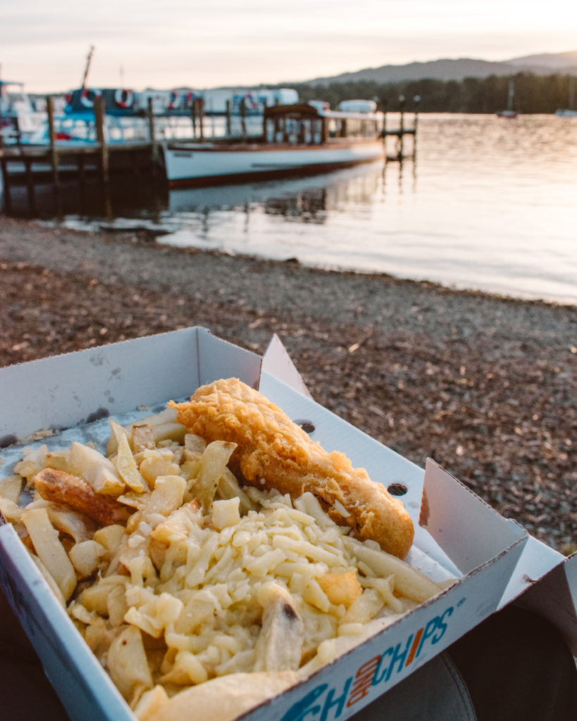 Fish and chips on the shore of Windermere at sunset
