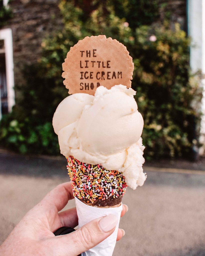 Two scoops of ice cream in a chocolate sprinkle cone from the Little Ice Cream Shop, Hawkshead
