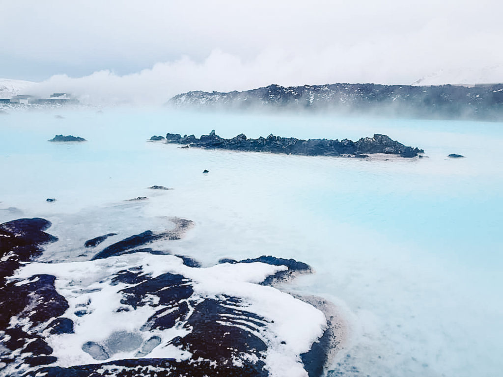 Steam rises above the turquoise waters of Iceland's Blue Lagoon