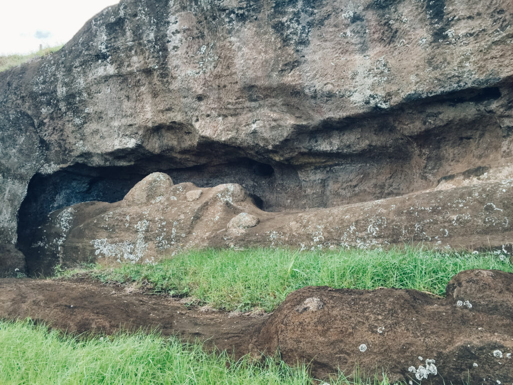 Partially carved moai in a rock face at Rano Rarakura