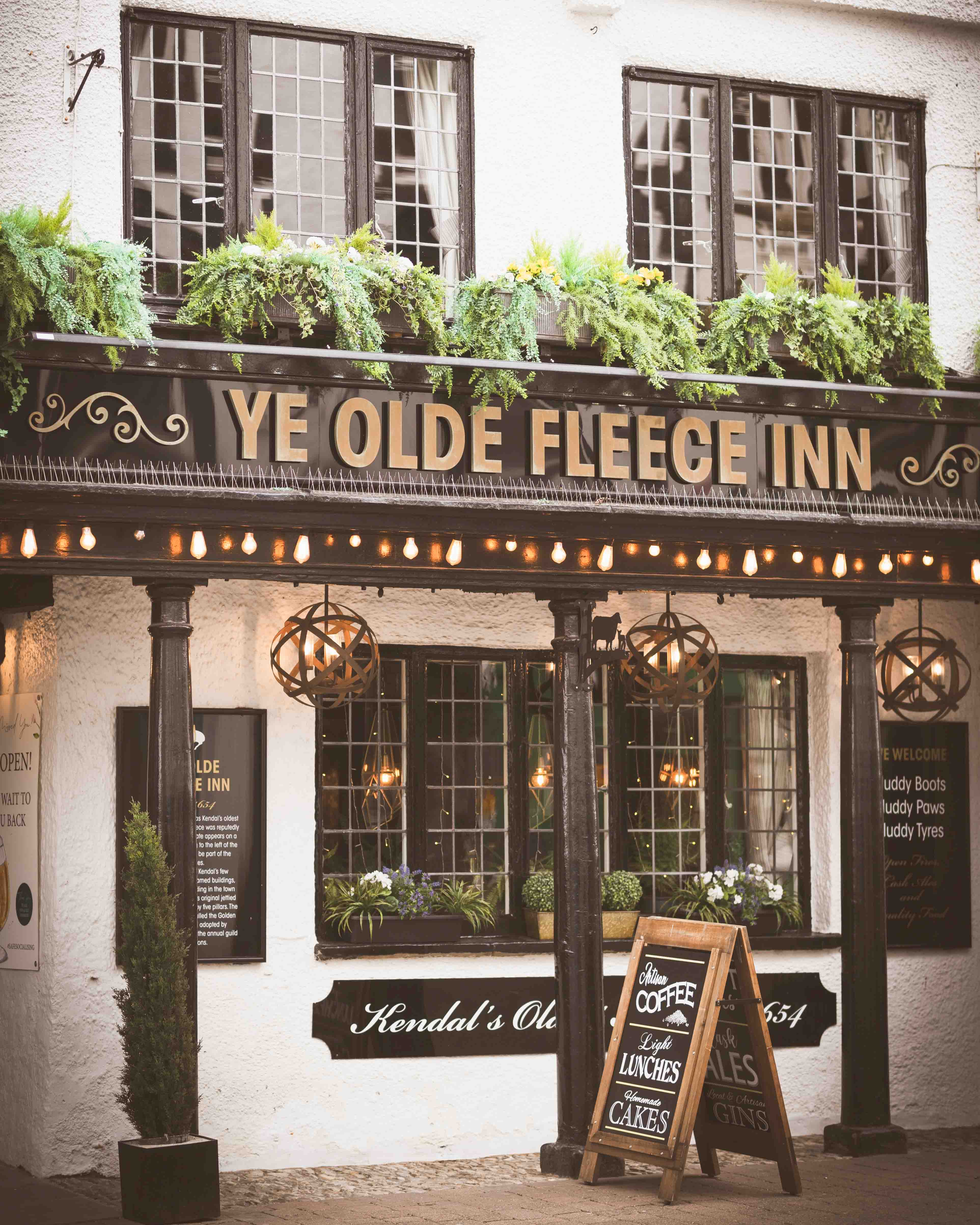 Wooden timber exterior of Ye Olde Fleece Inn, the oldest pub in Kendal