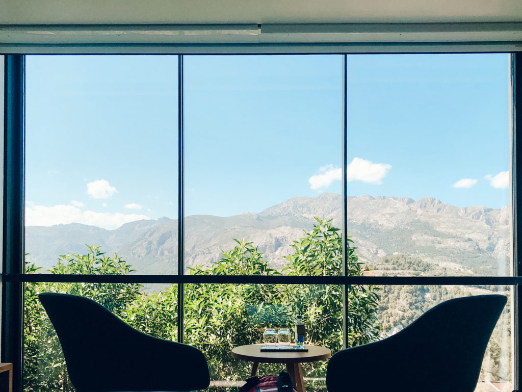 Large window of VIVOOD Landscape Hotel looking out onto mountains of Costa Blanca. 