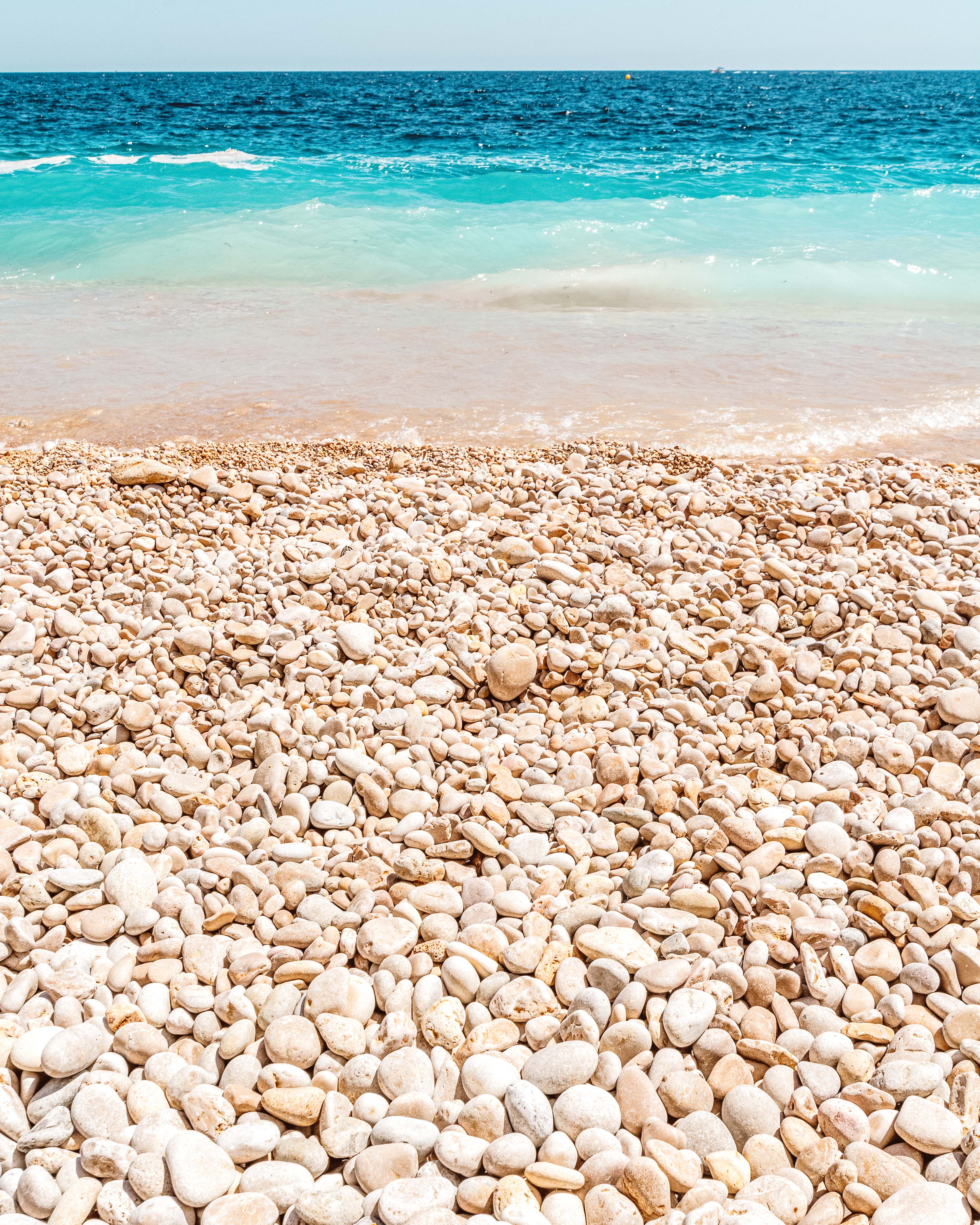 Pebble beach at Cala dels Testos.