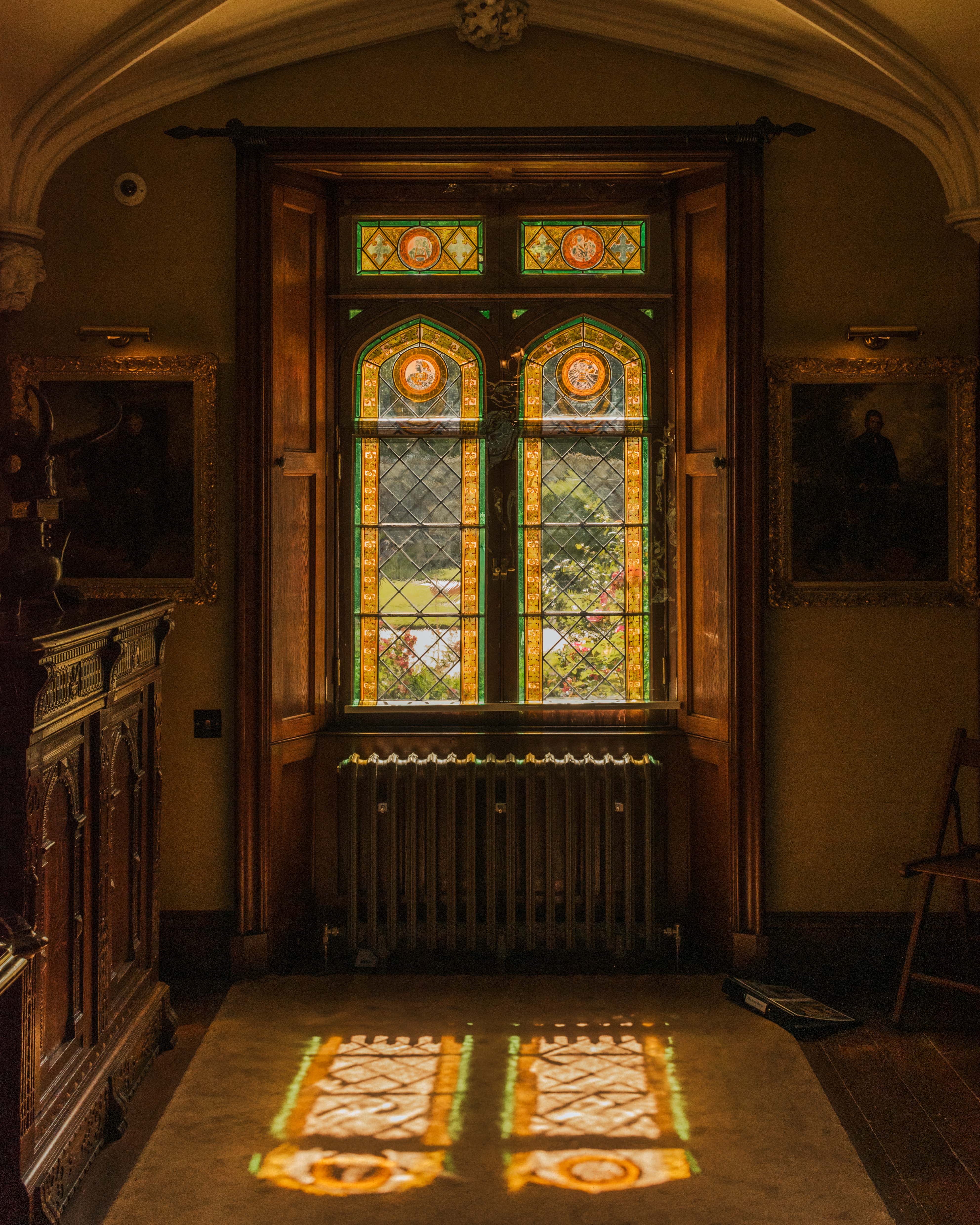 Sunlight streaming through a stained glass window at Abbotsford, the home of Sir Walter Scott
