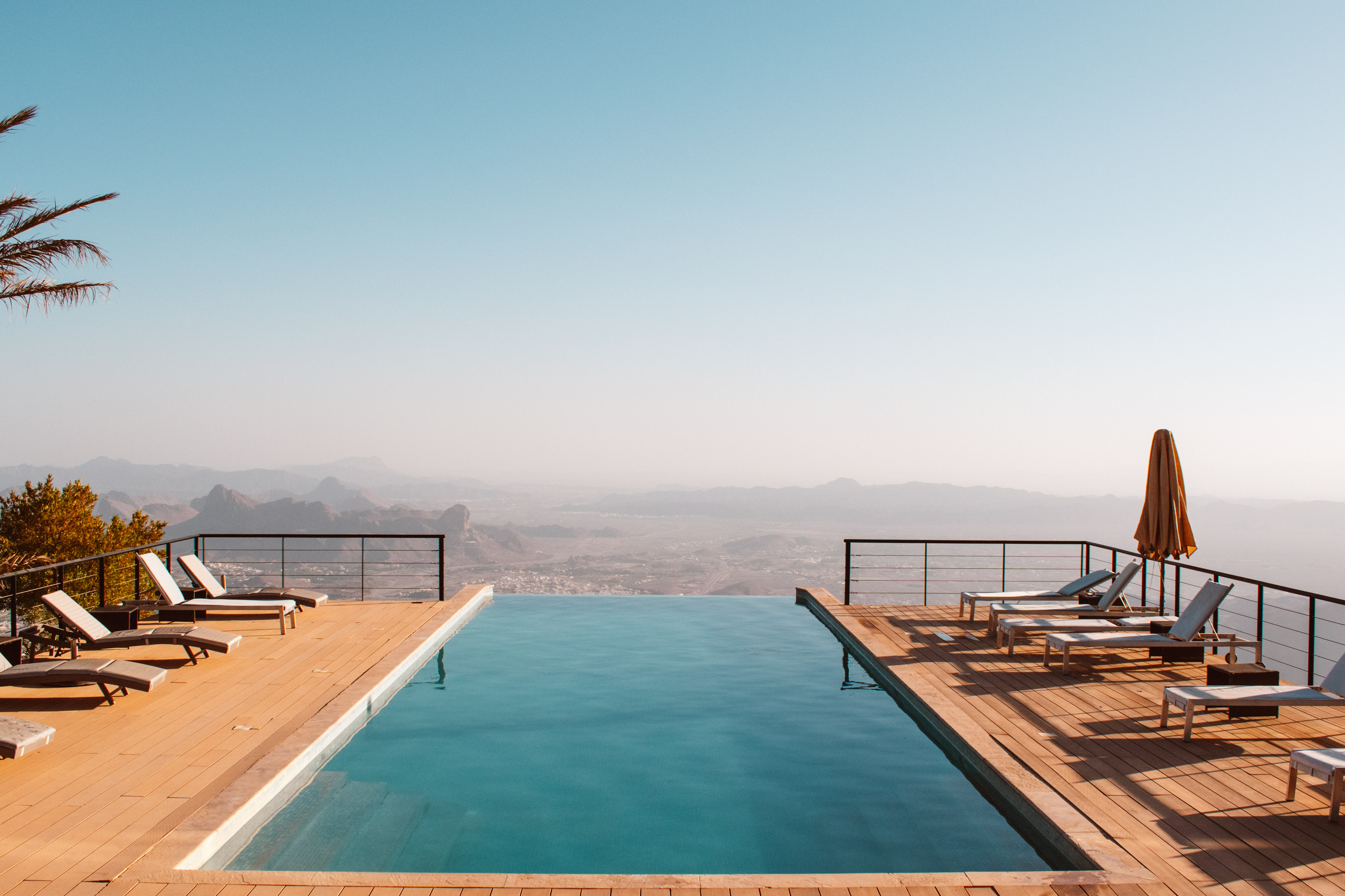 Infinity pool at The View, looking out over the mountains of Oman and Al Hamra