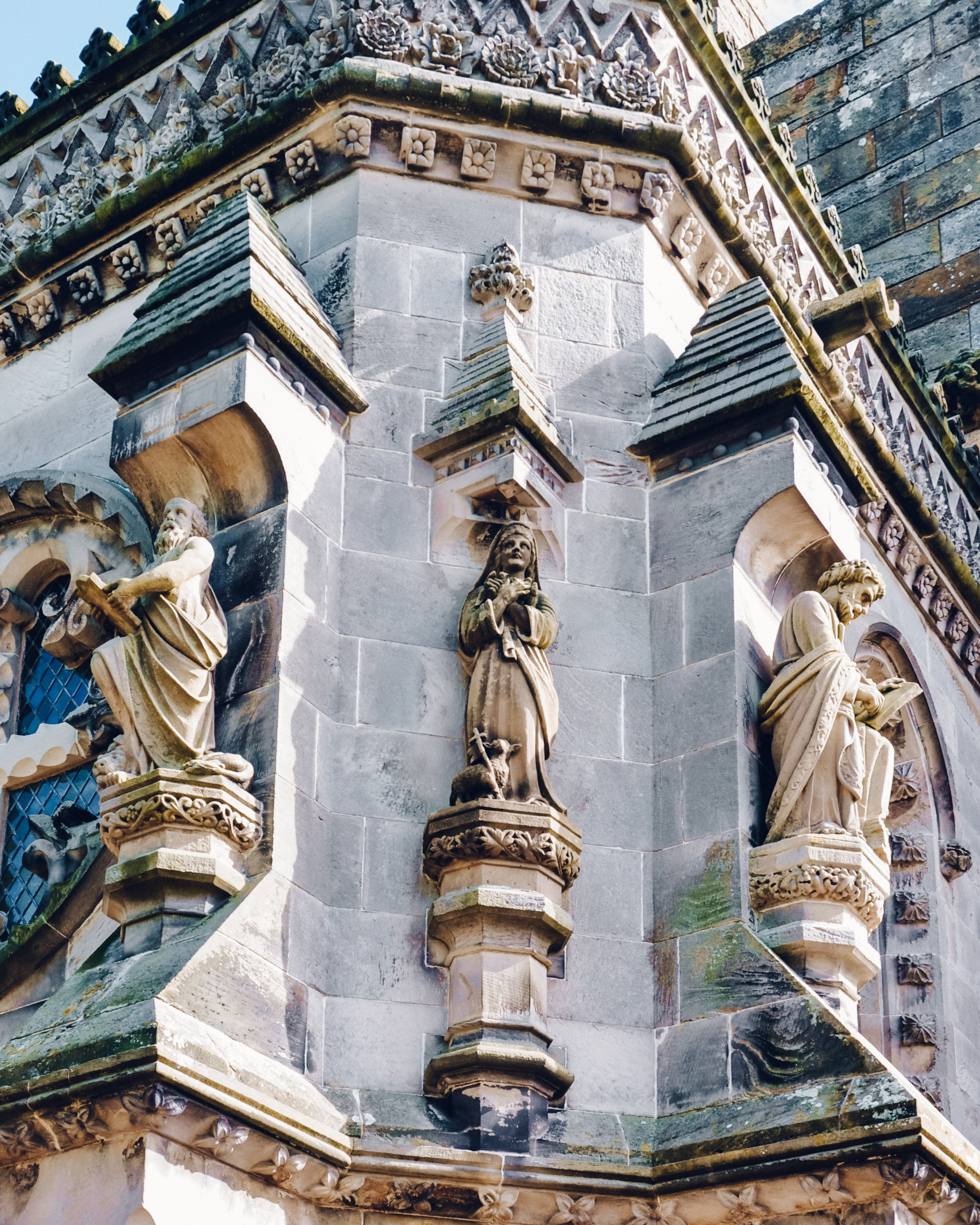 Delicately carved stone figures on the outside of Rosslyn Chapel, Edinburgh, Midlothian 