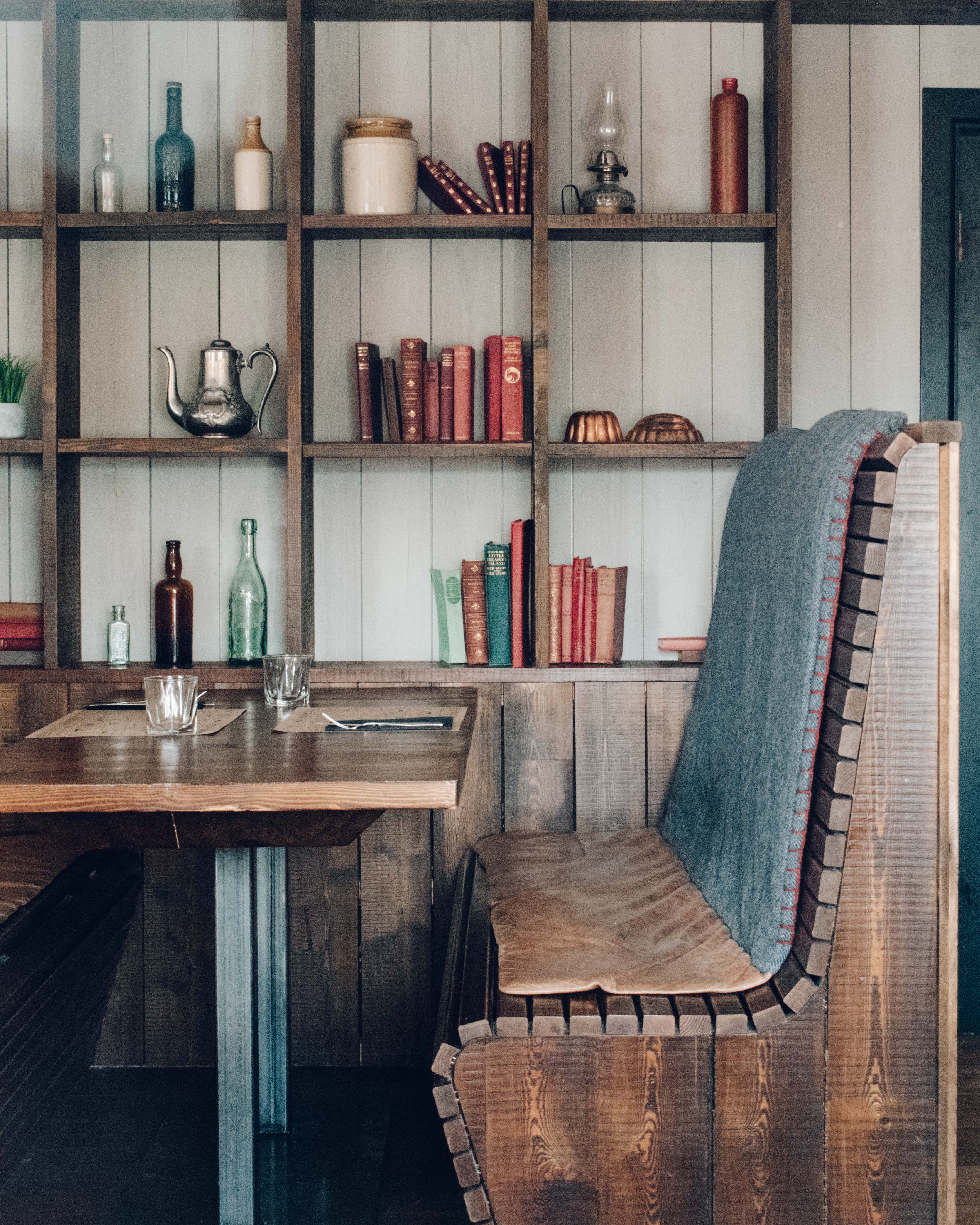 Dark wood panelled booth at Dulse and Broth in Portree