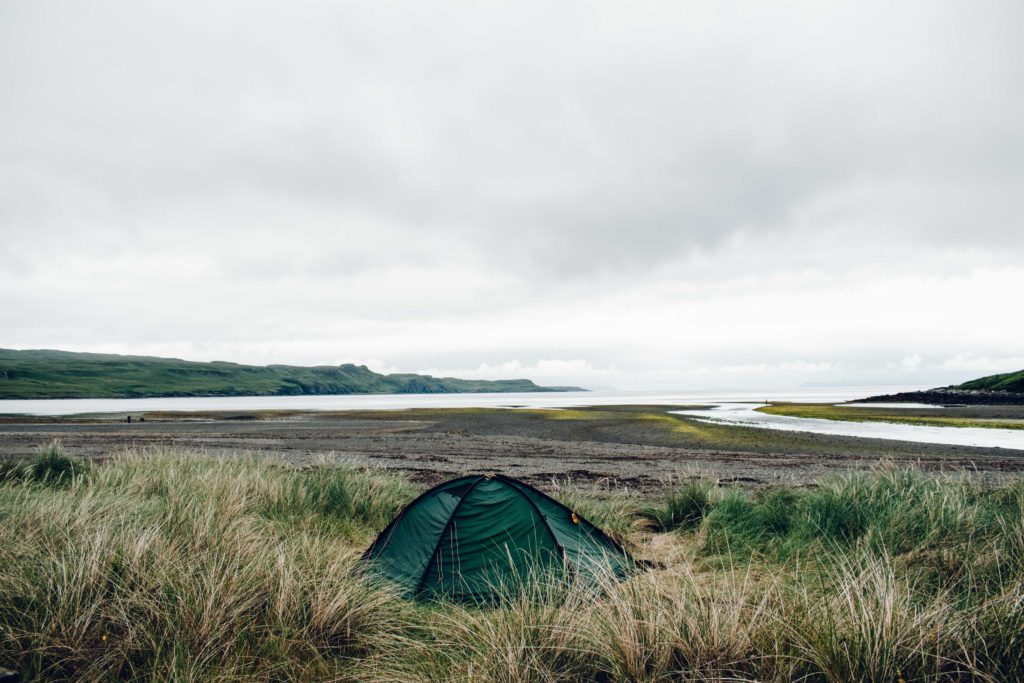 Green tent on a beach on Skye 