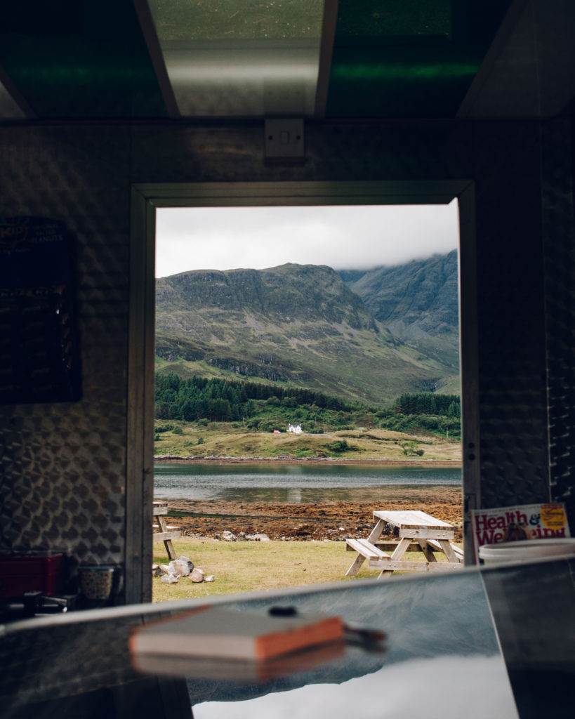 View through Mrs Mack's Food Truck on the Isle of Skye to the mountains beyond
