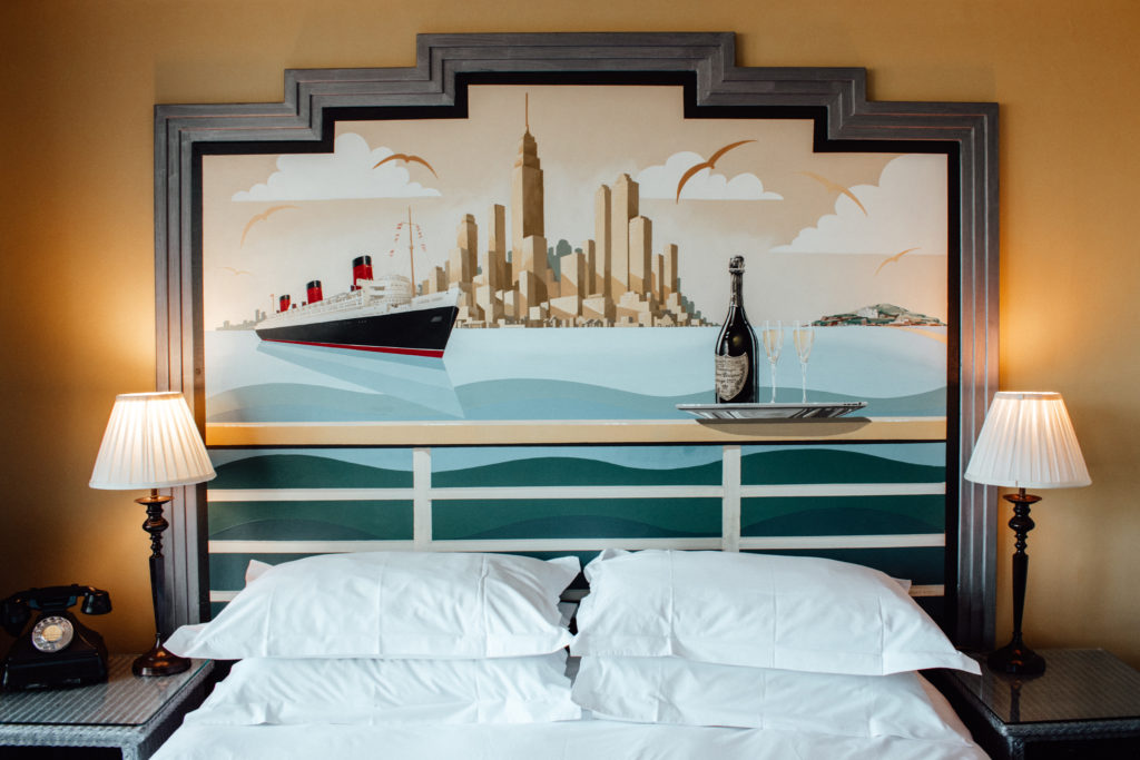 Painted headboard and Art Deco interiors inside Burgh Island Hotel