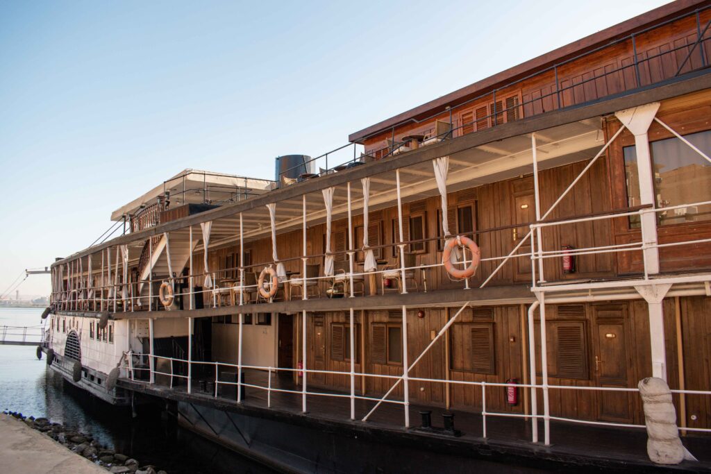 Wood panelled Steam Ship Sudan moored up on the River Nile