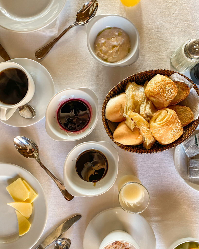 Breakfast spread on white linen table cloth on a Nile Cruise aboard the SS Sudan, the last paddles team on the River Nile