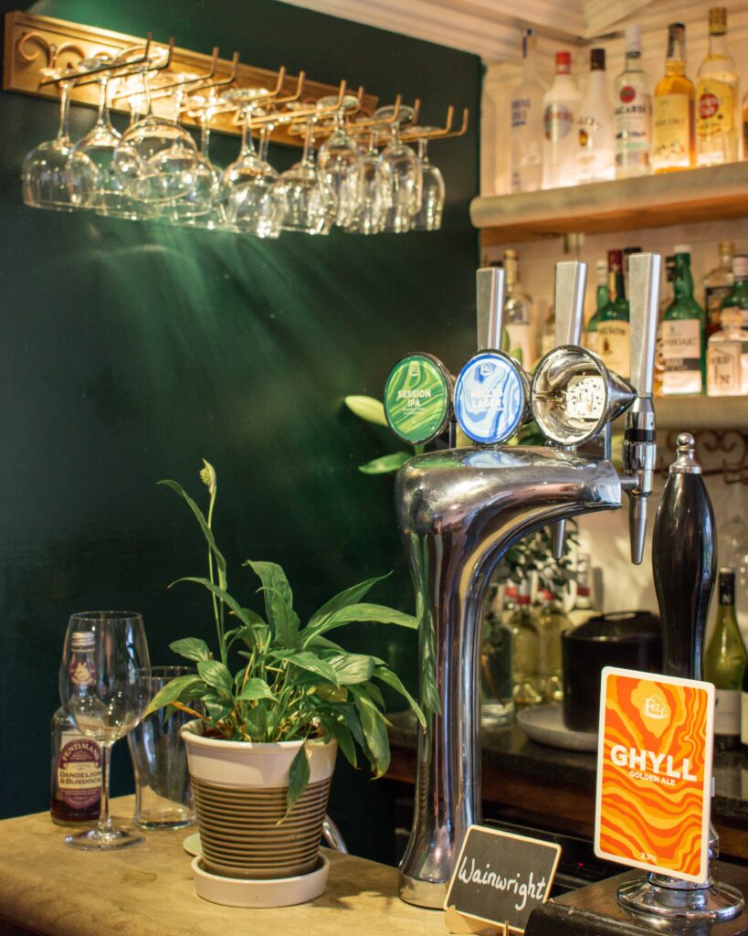 Beer taps of Poet's Bar in the Lake District