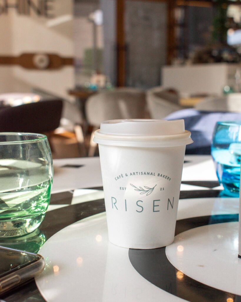 Coffee cup on table at Risen Dubai