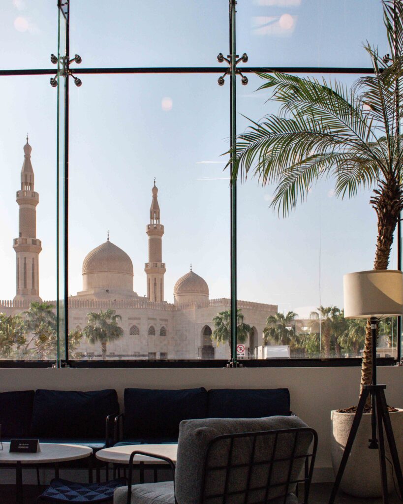 Where to Eat Dubai - view of minarets of mosque through window of Mirzam chocolate shop
