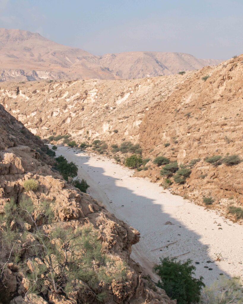 View above Wadi Al Abraeen in Oman showing the off road route through the wadi bed