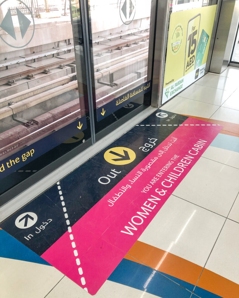 Women and Children sign on the floor of Dubai metro