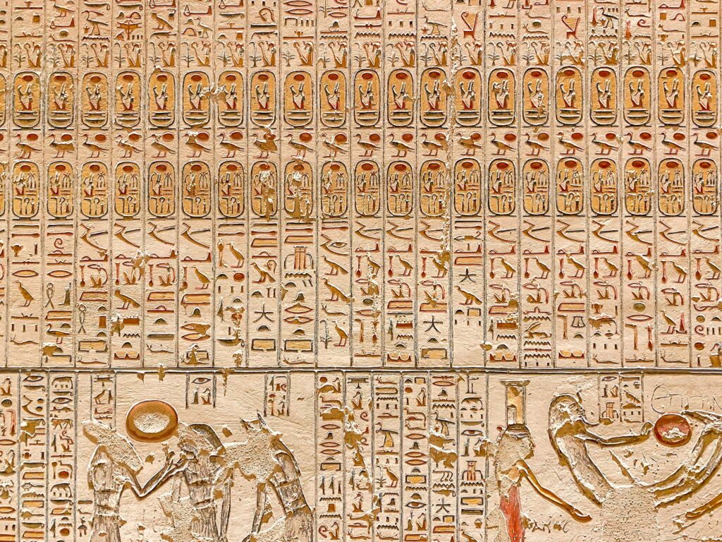 Detailed close up of wall in tomb of Rameses V and VI showing the Pharoah's cartouche and hieroglyphics, Valley of the Kings