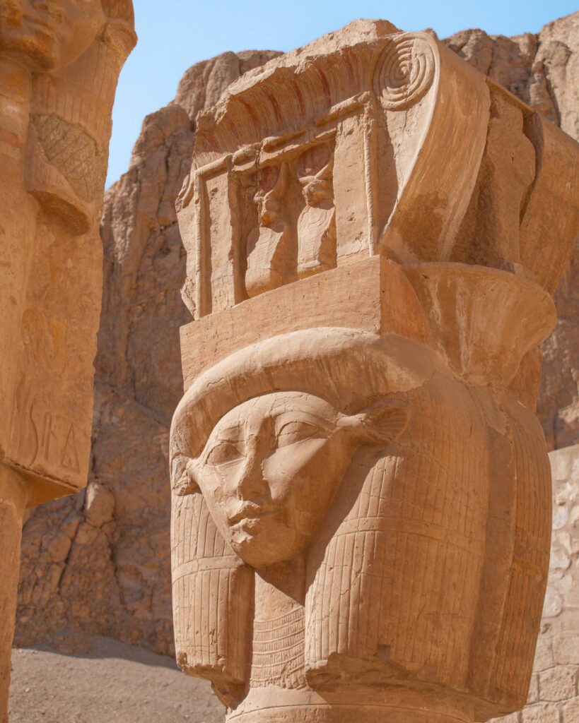 Face carved into a column at Hatshepsut's Mortuary Temple, Egypt