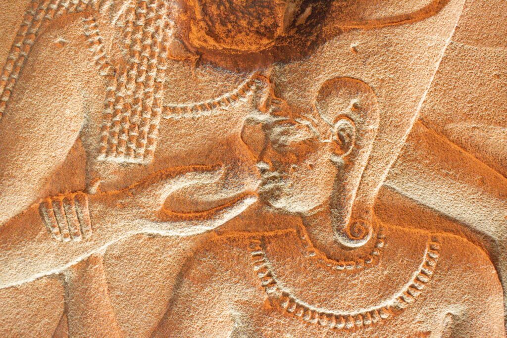 Close up of relief detail of Pharaoh of Upper Egypt on the walls of Philae Temple