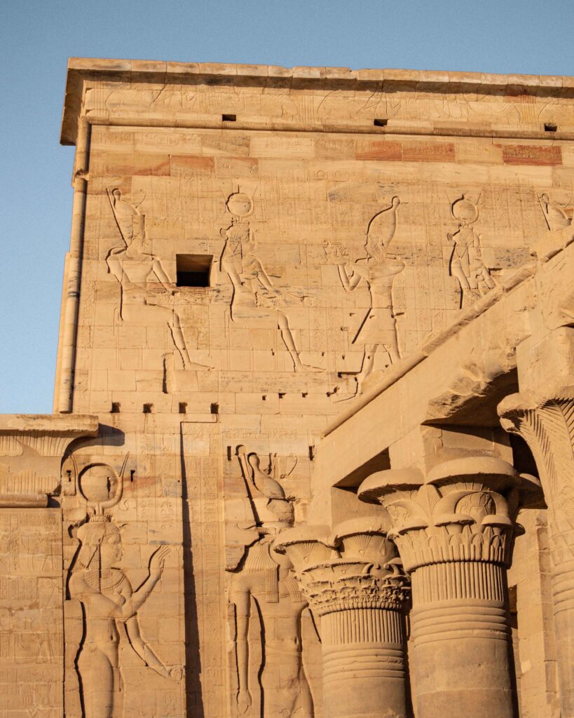 Stone front wall of Philae Temple depicting the Pharaohs of Upper Egypt