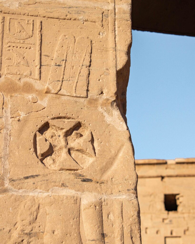 Coptic cross etched into the wall of Philae Temple, Aswan, Egypt
