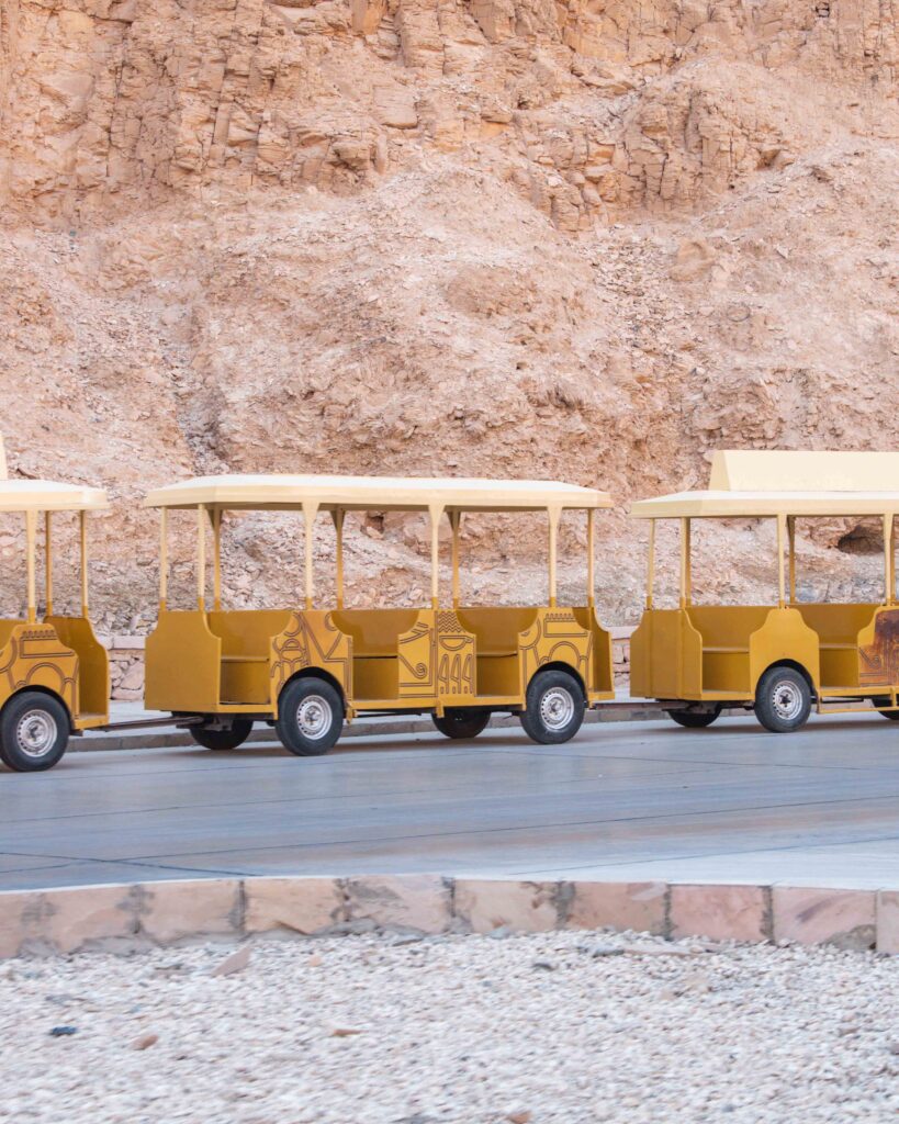 Yellow tourist golf buggy at Valley of Kings