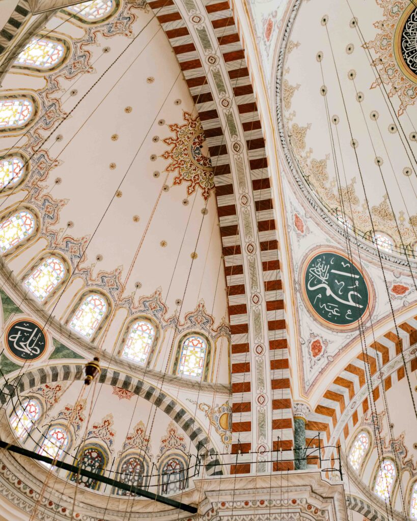 Intricately painted dome of Süleymaniye Mosque from the inside